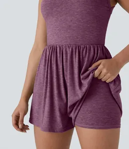 Sleeveless purple skort romper detail showing internal shorts and heathered fabric texture