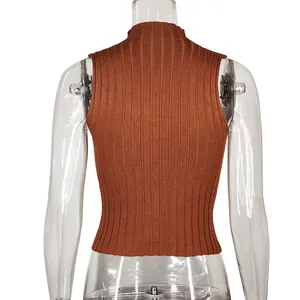 Detail showing the back view of a rust brown ribbed knit sleeveless slim fit tank top