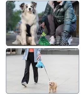 Hands-free dog waste bag holder clip attached to a retractable leash in outdoor park.
