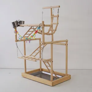 Grand terrain de jeu en bois pour perroquets avec échelles, balançoires et bols en inox