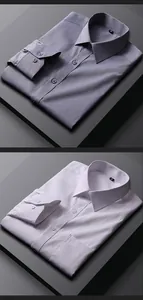 Detail of folded men's long-sleeve shirts in white and grey for business wear