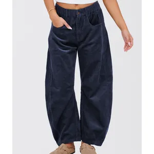 Front view showing the fit and texture of navy blue high-waisted wide-leg corduroy pants
