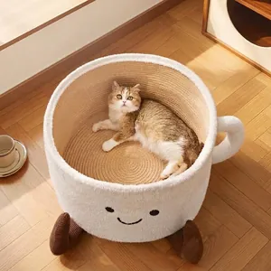 Large coffee cup-shaped cat bed with woven rope interior and plush smiley face design