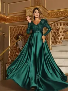 Elegant emerald green deep V-neck evening gown with sequined bodice and satin skirt