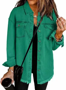 Stylish green washed denim shirt jacket featuring a trendy raw frayed hem detail.