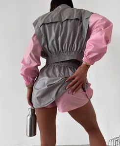 Detail view showing the back construction and gray-pink color block of the sports set