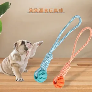 Interactive dog rope toy with treat-dispensing rubber ball for teeth cleaning, 25cm