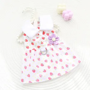Cute strawberry print pet dress featuring white collar and purple flower decoration