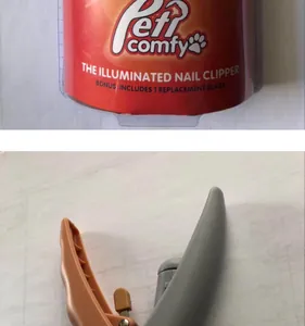 Close-up detail of Peti Comfy illuminated dog nail clipper packaging and ergonomic handle.