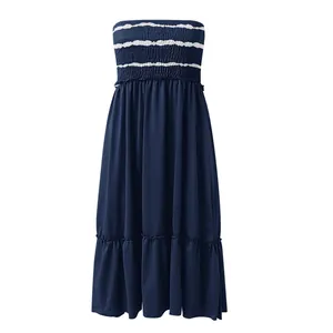 Front view of elegant navy blue strapless smocked midi dress with white striped details