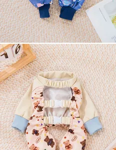 Detail view of dog waterproof dust-proof pants with cute bear prints and adjustable buckles