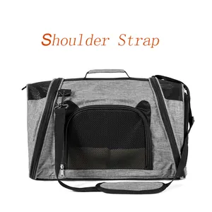 Close-up of grey foldable cat carrier featuring a durable black mesh ventilation window.