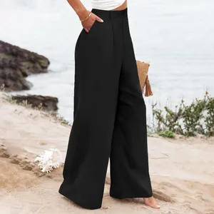 Vista dettagliata dei pantaloni estivi neri a vita alta e gamba larga da donna