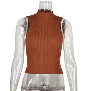 Detail view of the vertical ribbed texture on a brown slim-fit sleeveless knitted tank top.