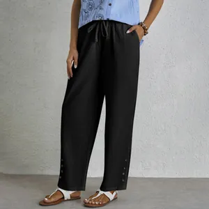 Women's black cotton linen drawstring casual pants with pockets and button hem