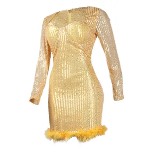 Detailed view of a sexy gold sequin mini dress featuring feathered hem and bodycon fit.