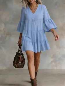 Light blue V-neck tiered mini dress with flared sleeves for summer vacation
