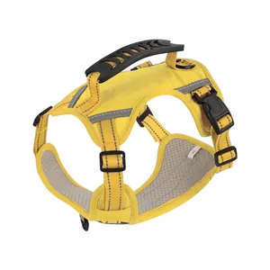 Detailed view of yellow reflective dog harness showing sturdy handle and buckle