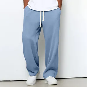 Pantalon de détente pour homme en tricot gaufré bleu clair, coupe ample et cordon