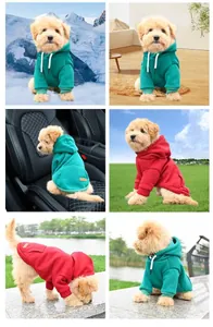 Warm fleece dog hoodie in vibrant red and green colors for winter outdoor activities