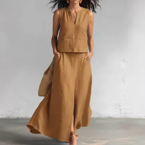 Sleeveless V-neck top and maxi skirt two-piece linen set in solid camel color.