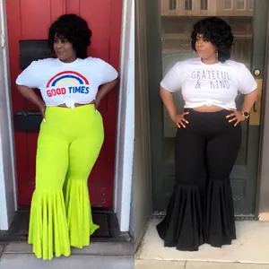 Sexy high-waisted ruffled flare trousers in vibrant neon green and classic black