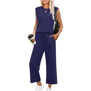 Casual women's navy blue two-piece lounge set with sleeveless tank top and wide-leg pants.