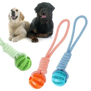 Durable dog rope ball toy for chewing and teeth cleaning with food leaking feature.