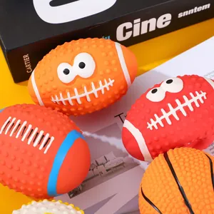 Detailed macro shot of squeaky latex pet football and basketball toys with textured surface