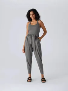 Women's stylish grey sleeveless harem jumpsuit with tapered legs and soft fabric for casual wear