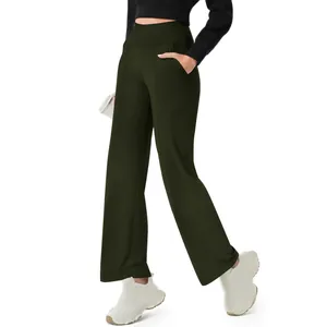 High-waisted dark green yoga pants with pockets, showing comfortable straight-leg fit.