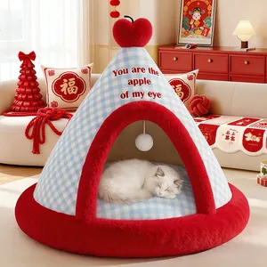 Cozy blue checkered enclosed cat teepee bed with red apple decor and sleeping white cat