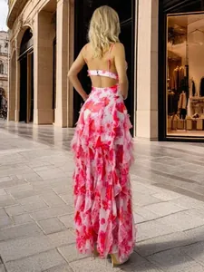 Back view of pink floral chiffon long dress with ruffles and elegant backless design