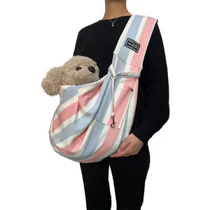 Striped pet sling carrier bag for small dogs and cats up to 15 lbs, pink and blue stripes