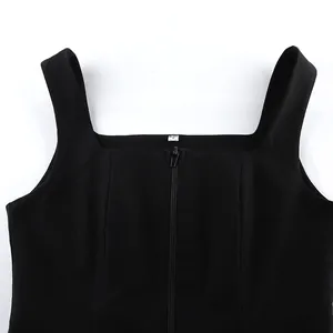 Detail view of a black square neck vest featuring a front zipper and size S label