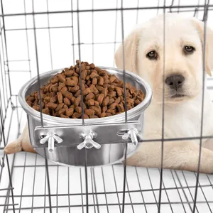 Detail of stainless steel hanging bowl securely attached to a pet wire cage