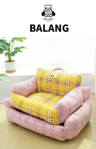 Detail view of British style plush cat sofa bed with cute big eye design and handle