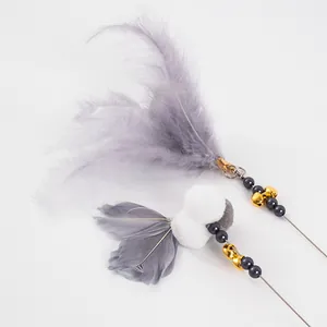 Interactive cat teaser wand toy with grey feathers and golden bells on a long wire.