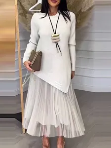 Elegant two-piece set featuring a white knit top and a grey pleated tulle skirt for women.