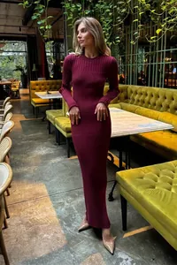 Elegant burgundy ribbed knit maxi dress featuring a slim fit and long sleeves for winter