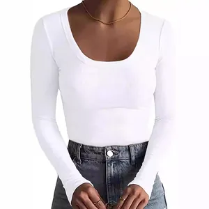 Detailed view of women's white ribbed long sleeve T-shirt with scoop neck fit.