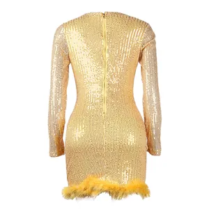 Detailed back view of sexy gold sequin bodycon dress with feather trim and long zipper.