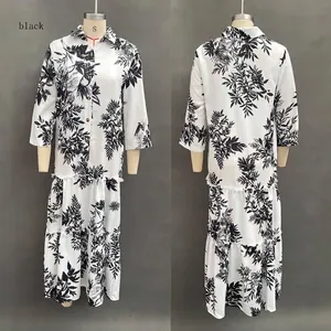 Vue de face et de dos d'une robe maxi à volants imprimé bohème à feuilles