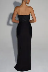 Back view of a sexy black strapless evening dress with sequined bodice detail