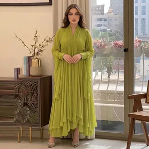 Detailed view of women's lime green long sleeve jumpsuit set with elegant matching shawl.