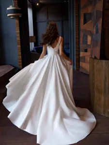 Elegant French vintage backless white evening gown with deep V-back and train