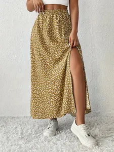 Elegante gonna lunga gialla a fiori stile boho con spacco laterale e vita elastica