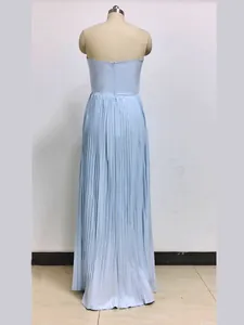 Close-up back view of a light blue strapless pleated evening maxi dress for women