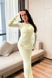 Elegant sheer lime green knit long sleeve maxi dress for beach cover-up and summer wear.