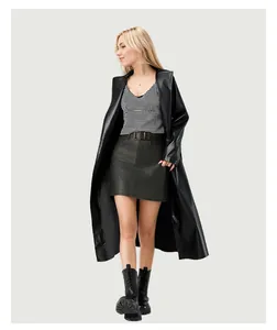 Full view of a stylish women's long black faux leather trench coat bathrobe style
